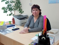 Титова